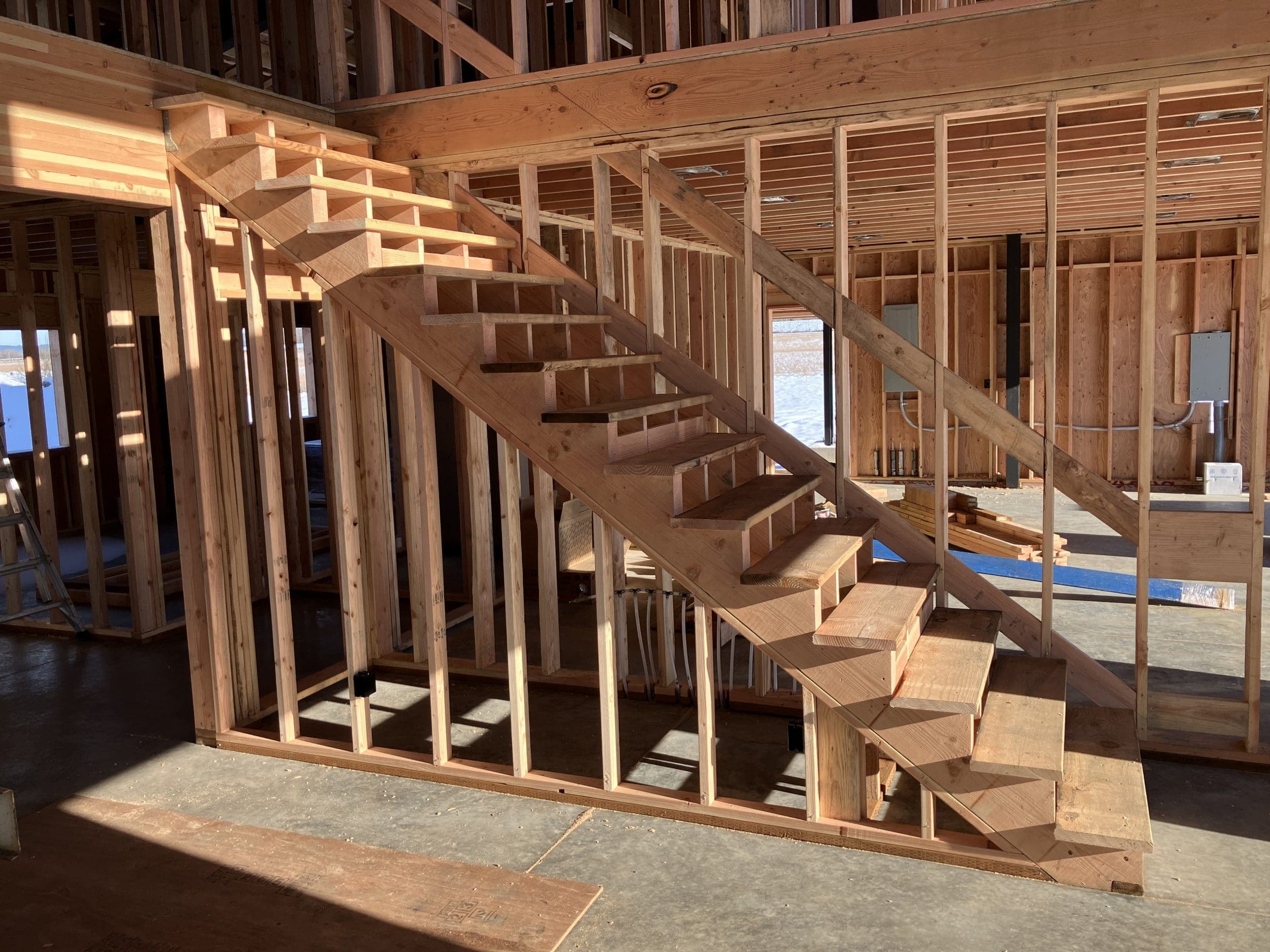 New staircase carriage framed and installed in a Portland-area new-construction home