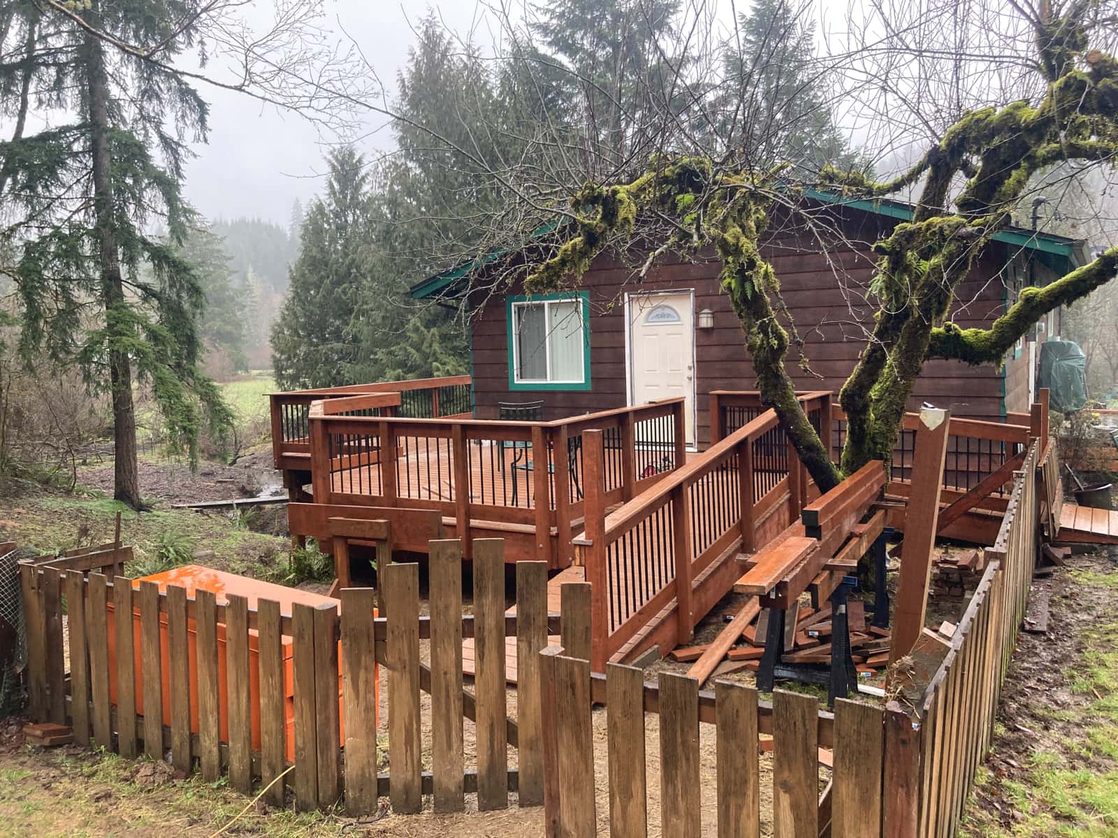 Exterior deck staircase at a wooded property — Stumptown Stairs, Portland, OR