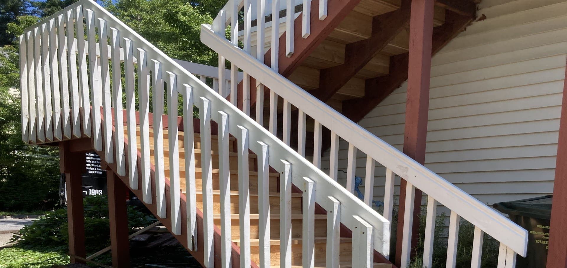 Finished wood staircase with painted risers and natural wood treads — Stumptown Stairs, Portland, OR
