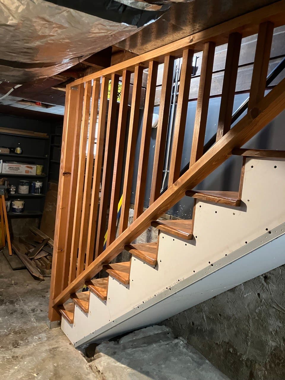 Restored historic staircase with a new wood railing, by Stumptown Stairs in Portland