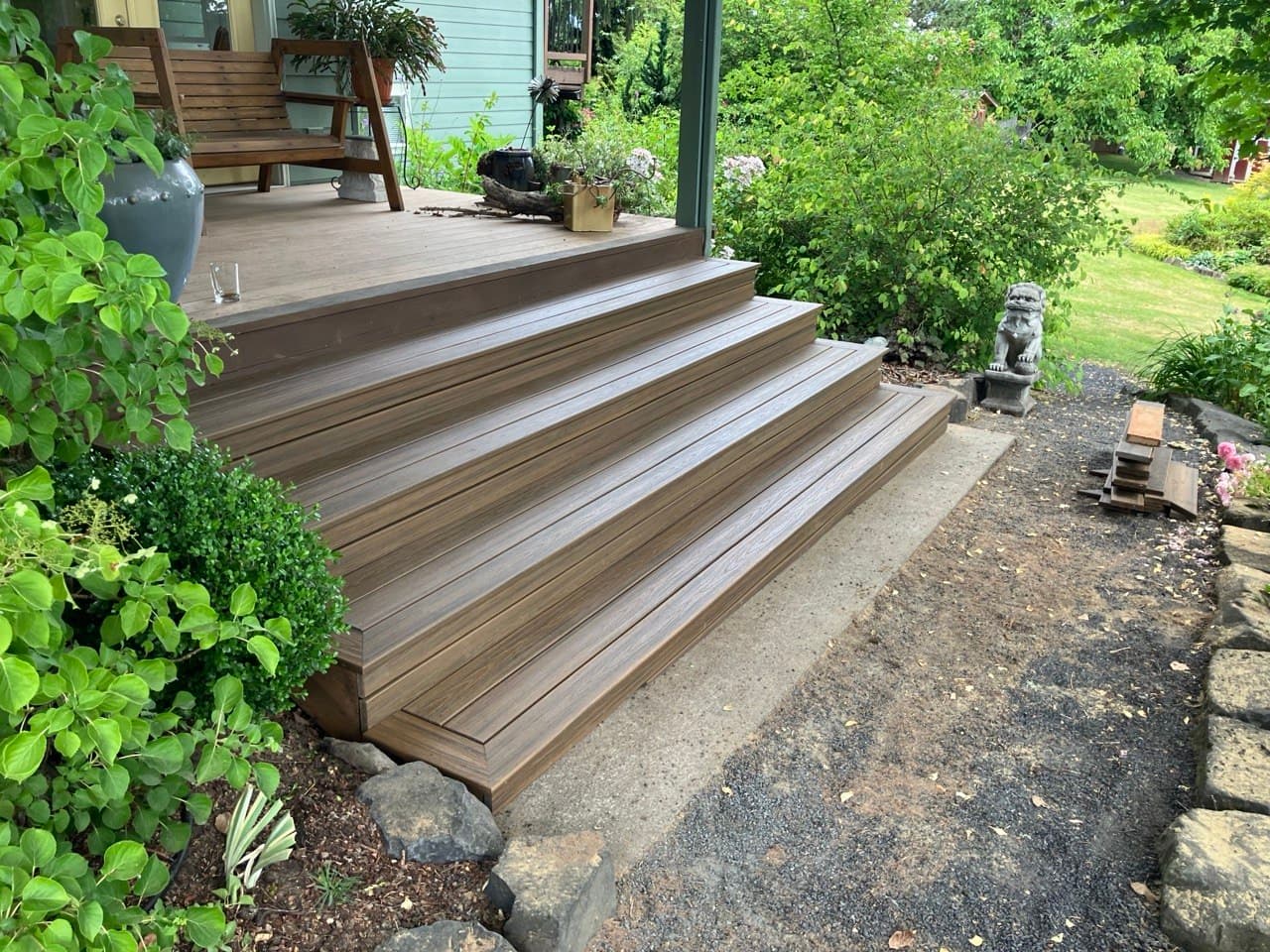 Rebuilt wide front-porch steps in composite decking — staircase remodel by Stumptown Stairs, Portland, OR