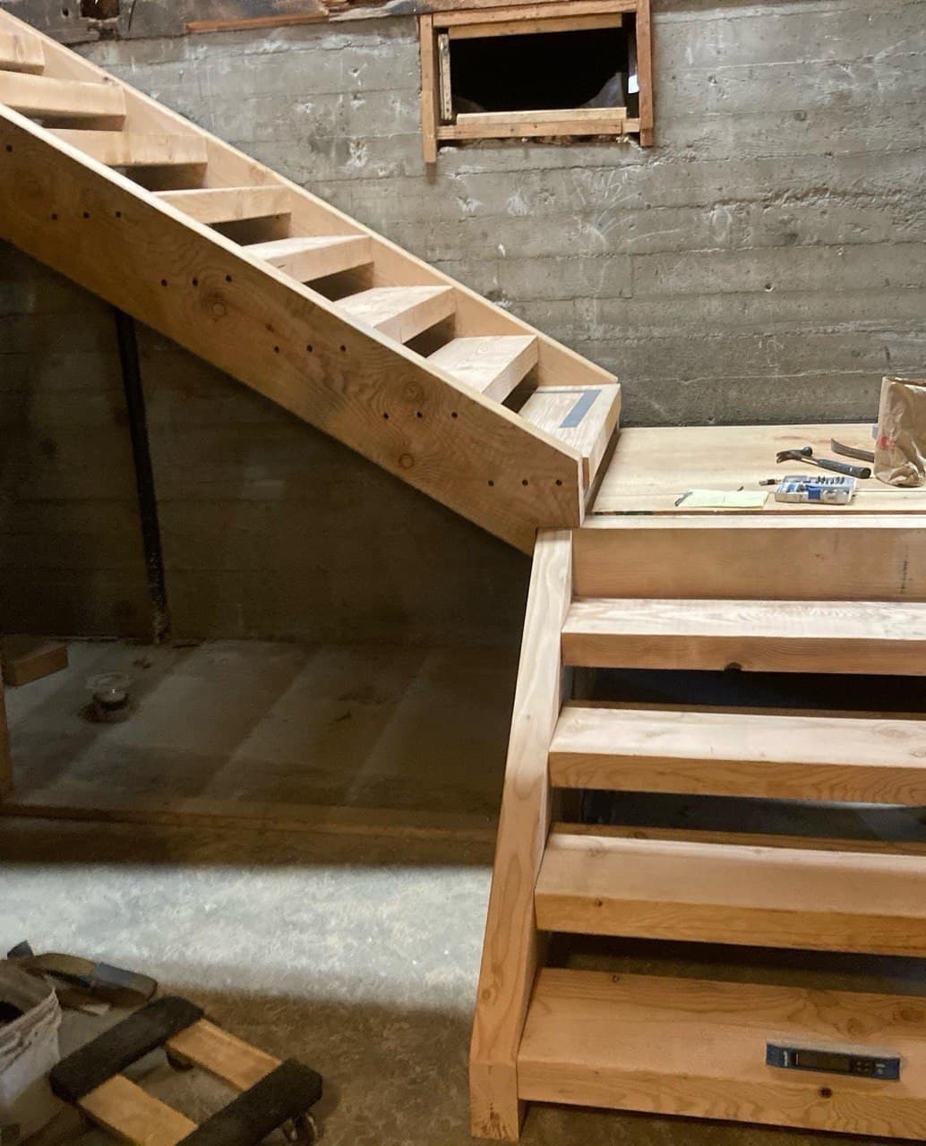 Newly framed replacement staircase during a basement stair replacement, Portland, OR
